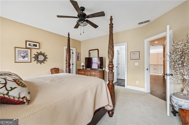 carpeted bedroom featuring ceiling fan