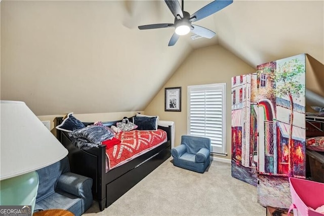 carpeted bedroom with lofted ceiling and ceiling fan