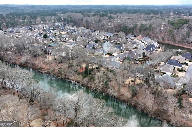 9135 Etching Overlook, Johns Creek, GA 30097 - aerial overview of property's location with a nearby body of water and nearby suburban area