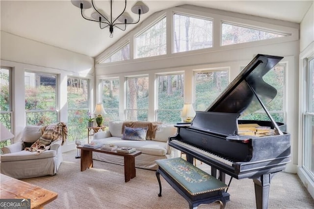 interior space featuring a chandelier and vaulted ceiling