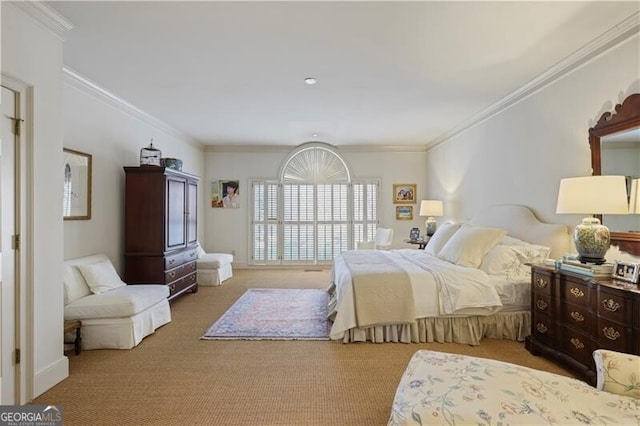 bedroom featuring crown molding and light colored carpet