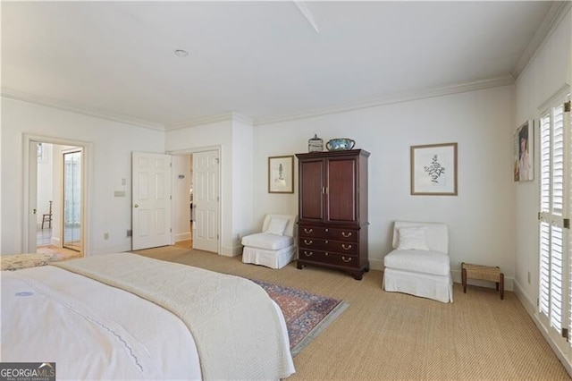 carpeted bedroom with ornamental molding