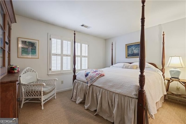 bedroom with light carpet