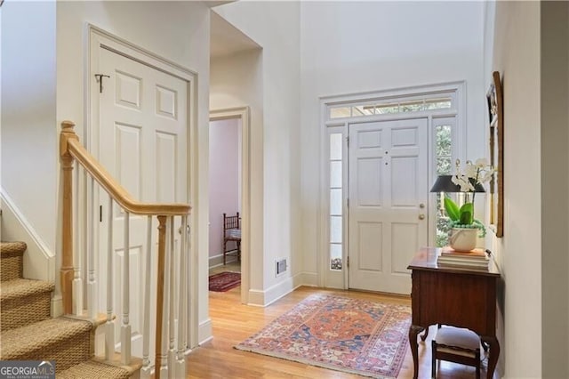 entryway with light hardwood / wood-style flooring