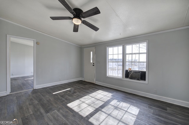 spare room featuring ornamental molding, dark hardwood / wood-style floors, and cooling unit