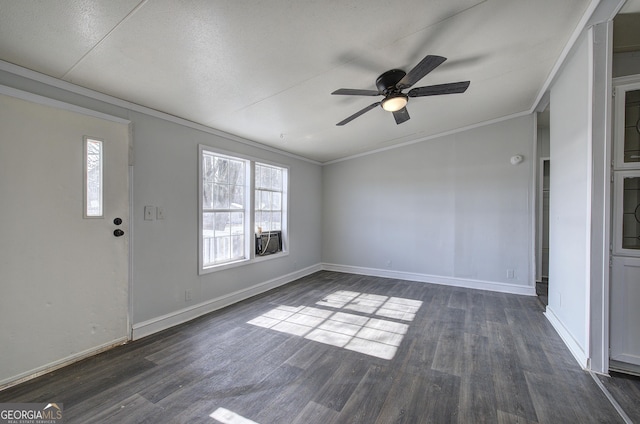 interior space featuring crown molding, dark wood-type flooring, and ceiling fan