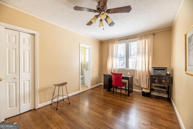 interior space featuring hardwood / wood-style floors, ornamental molding, a textured ceiling, and ceiling fan