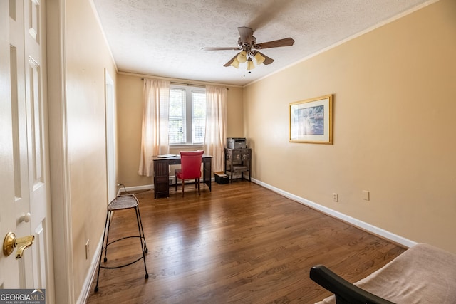 office featuring ornamental molding, ceiling fan, a textured ceiling, and dark hardwood / wood-style flooring