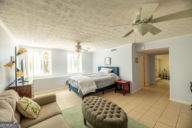 tiled bedroom featuring ceiling fan, ornamental molding, and a textured ceiling