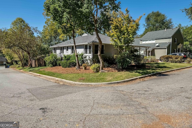 ranch-style house with a front yard