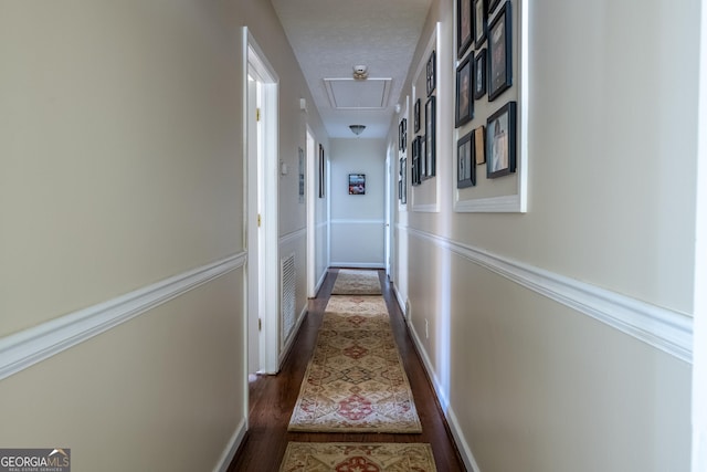 hall featuring dark wood-type flooring