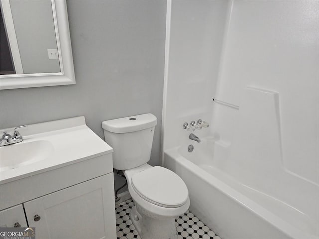 full bathroom with vanity, shower / bathtub combination, and toilet