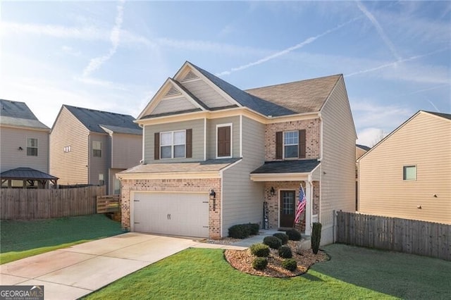 view of front facade featuring a garage and a front yard