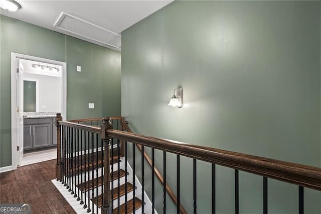 stairway featuring hardwood / wood-style flooring