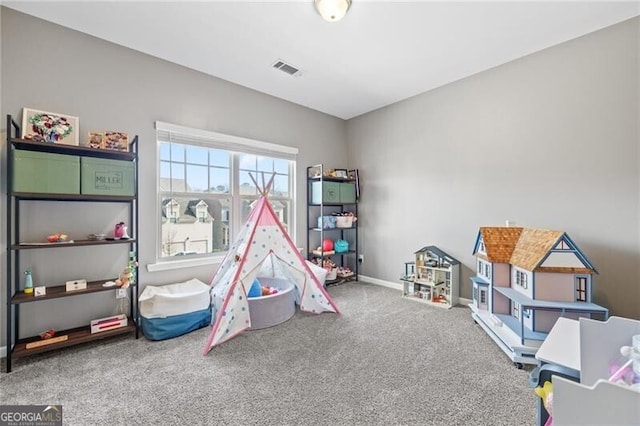 recreation room with carpet flooring