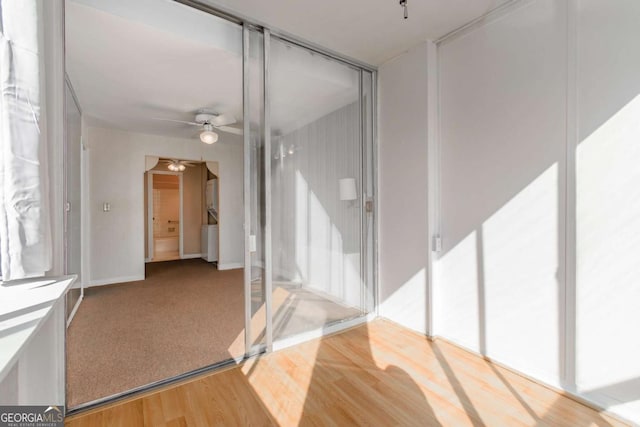 interior space with hardwood / wood-style flooring