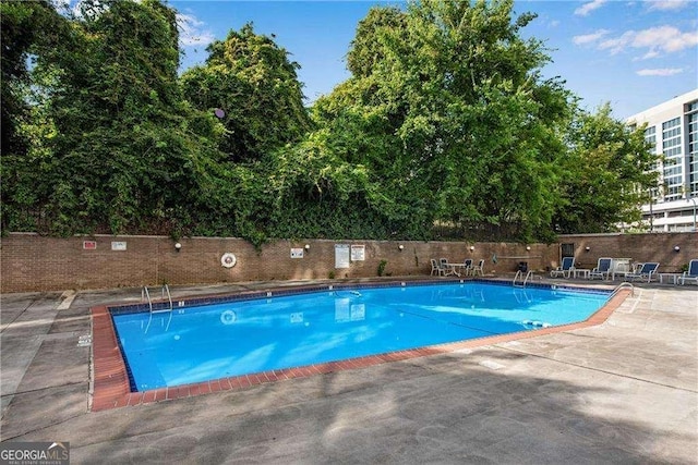 view of pool with a patio