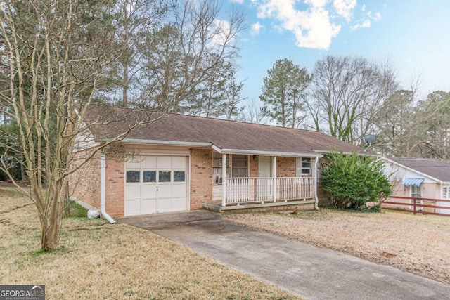 ranch-style house with a garage, a front lawn, and a porch