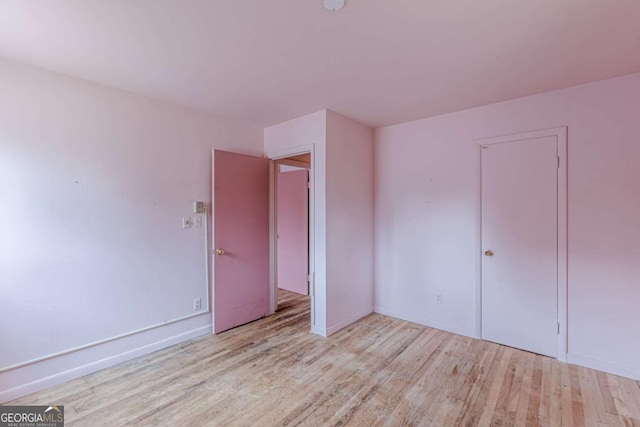 unfurnished bedroom featuring light hardwood / wood-style floors