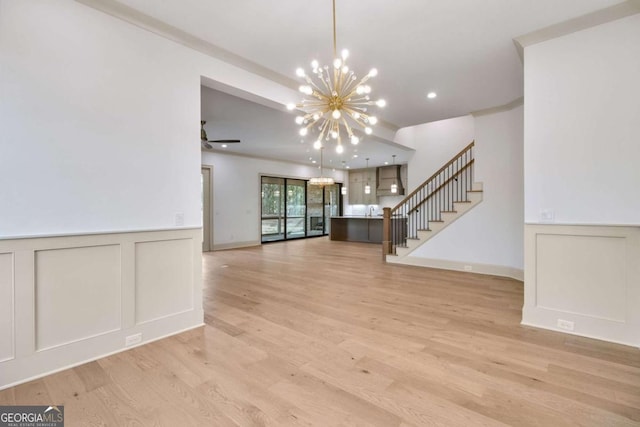 interior space featuring sink, a chandelier, and light hardwood / wood-style floors