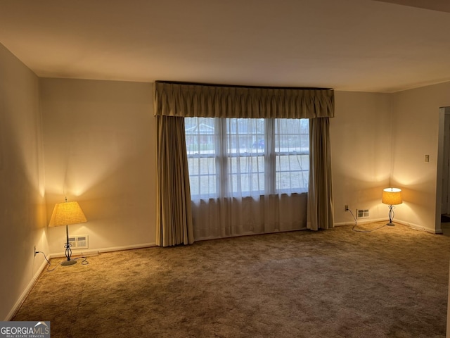 view of carpeted spare room