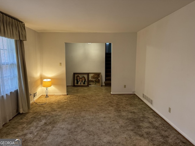 spare room featuring carpet flooring