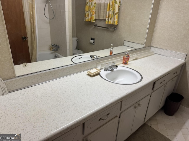 full bathroom with vanity, toilet, and shower / bath combo