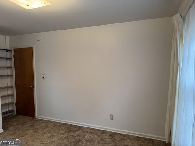 unfurnished bedroom featuring carpet floors