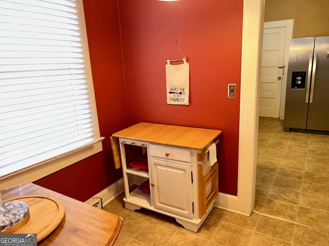 interior space featuring tile patterned flooring