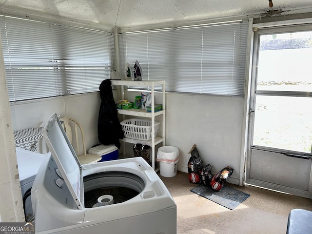 laundry area with washer / dryer