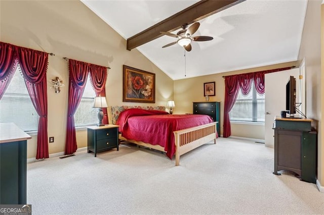 bedroom with ceiling fan, light carpet, and vaulted ceiling with beams