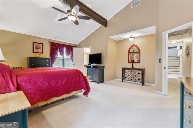 bedroom with beamed ceiling, ceiling fan, light colored carpet, and high vaulted ceiling