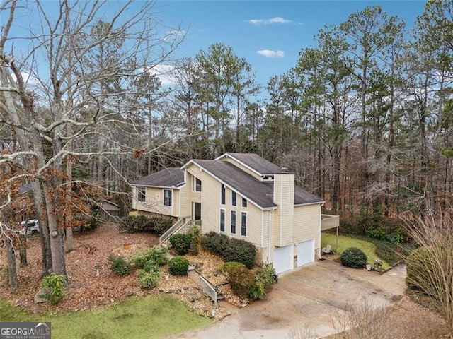 view of property exterior with a garage