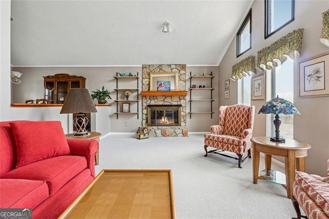 carpeted living room featuring lofted ceiling and a fireplace