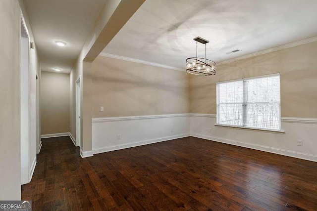 unfurnished dining area with baseboards, dark wood finished floors, and ornamental molding