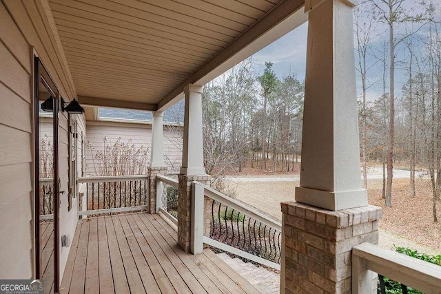 wooden deck featuring a porch