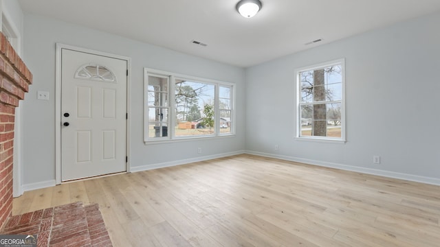 entrance foyer featuring light wood-type flooring