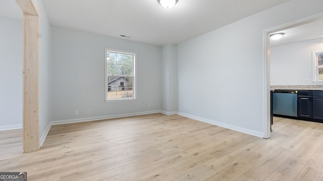 empty room with light wood-type flooring