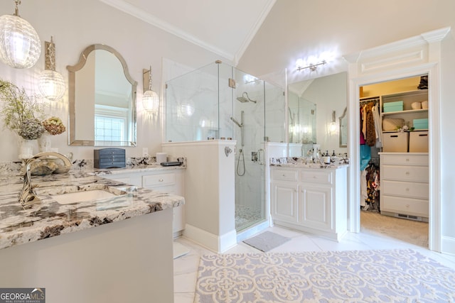 bathroom with crown molding, vanity, an enclosed shower, and vaulted ceiling