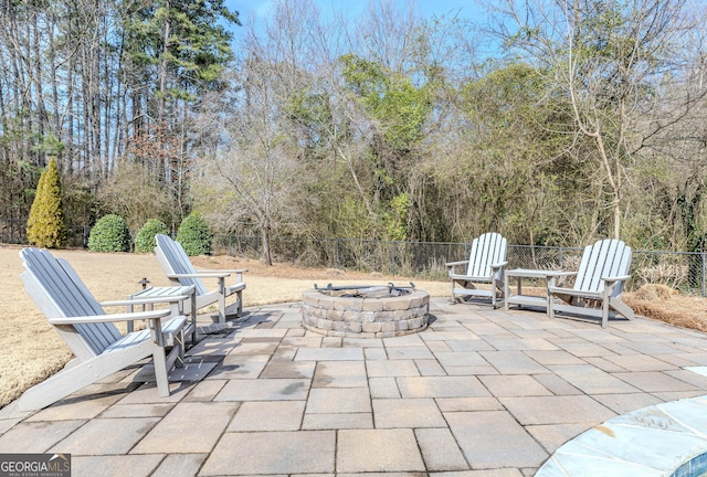 view of patio with a fire pit