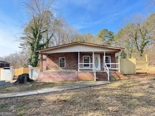 view of front of home featuring covered porch