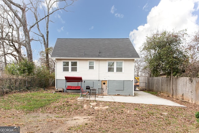 back of house featuring a patio