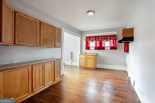 kitchen with light hardwood / wood-style floors