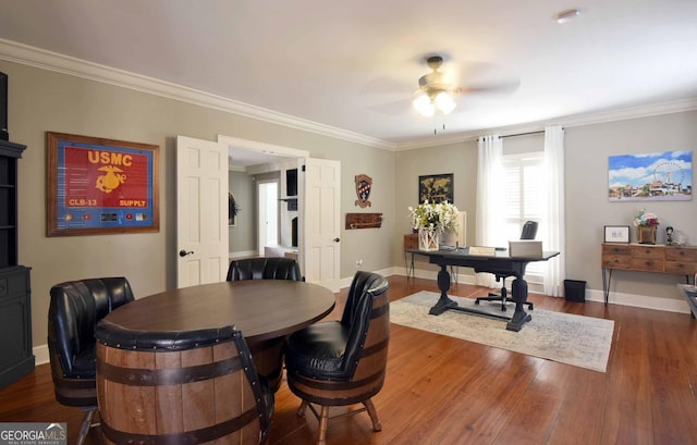 dining room with ornamental molding, dark hardwood / wood-style floors, and ceiling fan