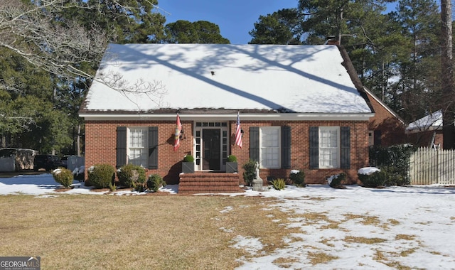 view of front of home with a yard