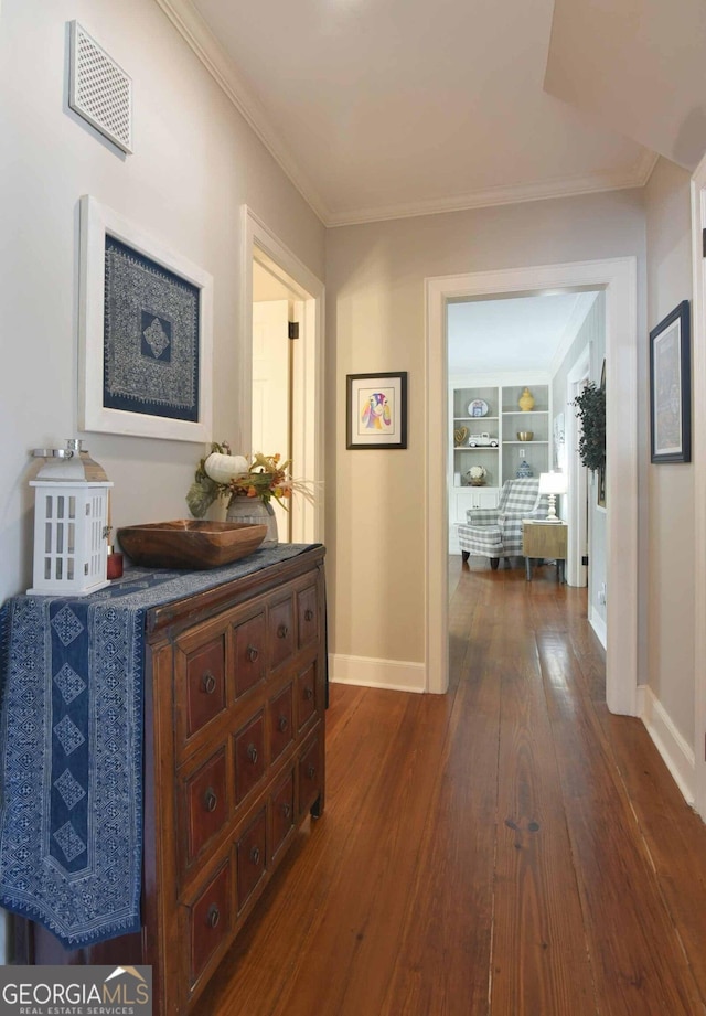 hall with crown molding and dark hardwood / wood-style floors