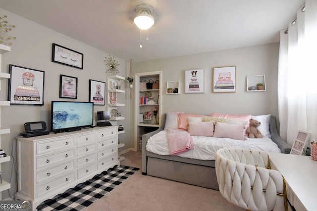 bedroom with light colored carpet and ceiling fan