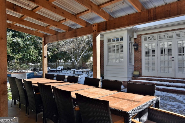 view of snow covered patio