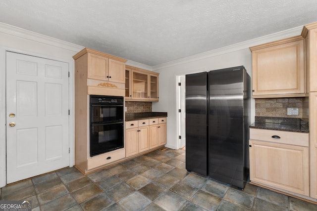 kitchen featuring fridge, black double oven, light brown cabinetry, and decorative backsplash