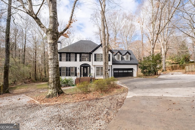 view of front of home with a garage